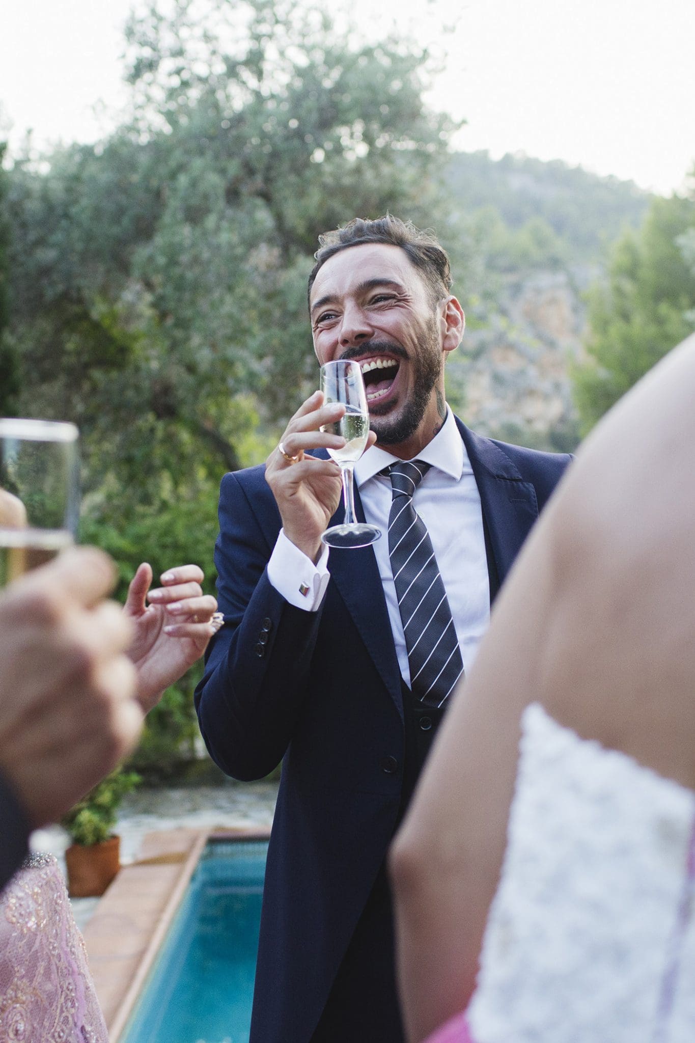 Happy Man Drinking At His Wedding Party