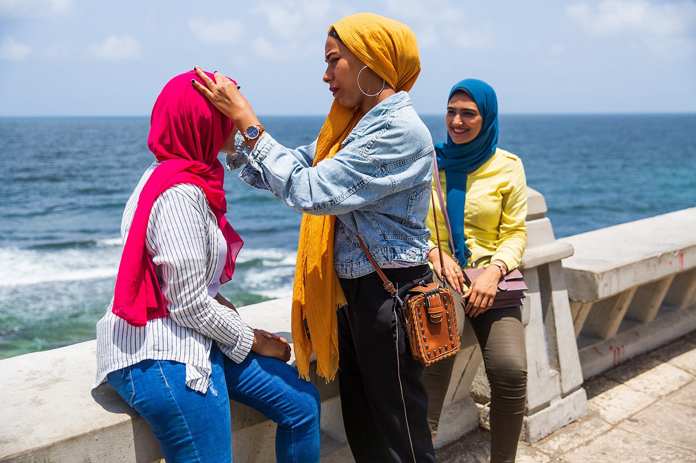 Girls in hajib hanging out by the Mediterranean Sea in Alexandria, Egypt.