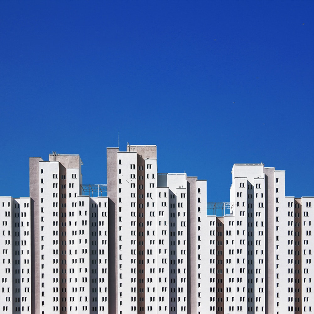 White buildings with blue sky background