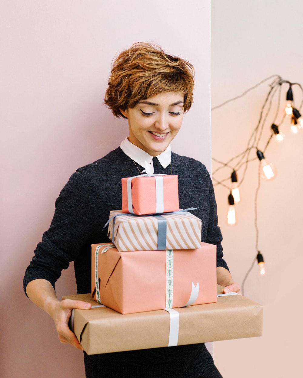 Attractive Woman With Gift Boxes