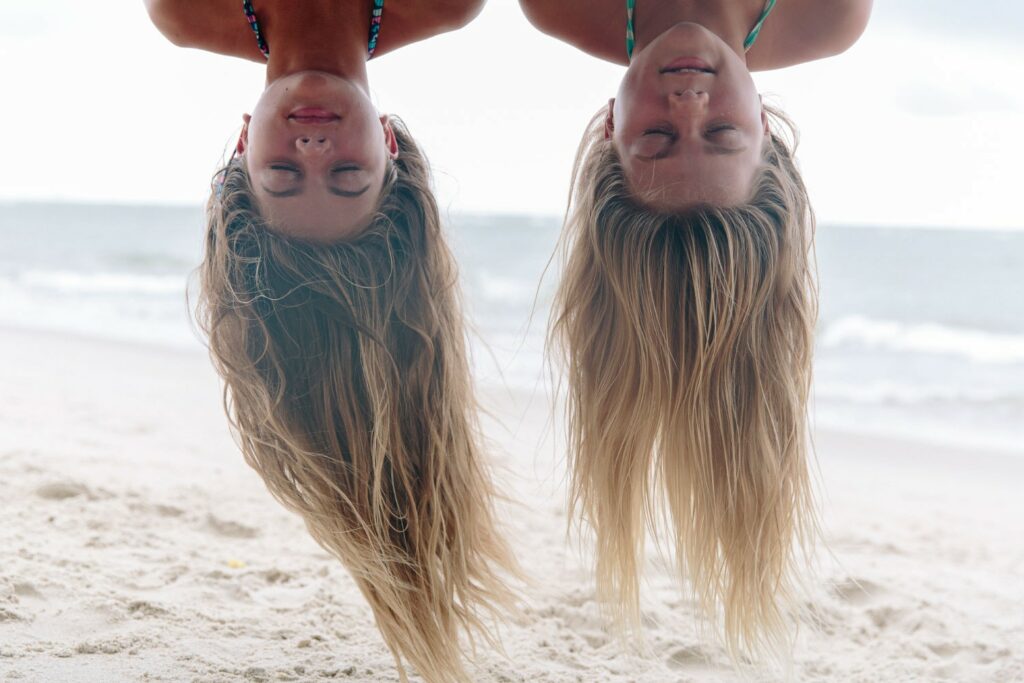 Stock Photo of Two Children Upside Down