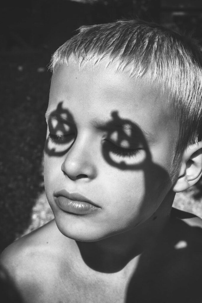 Blond Boy With Pumpkin Shadow On The Eyes, Halloween