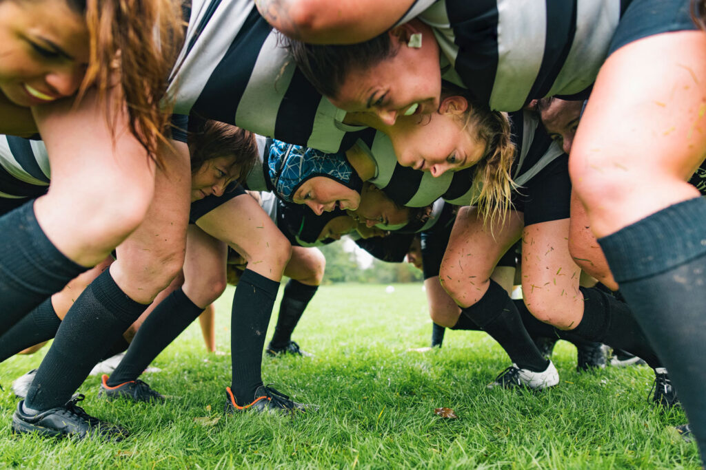 Close up of female rugby players in a scrum