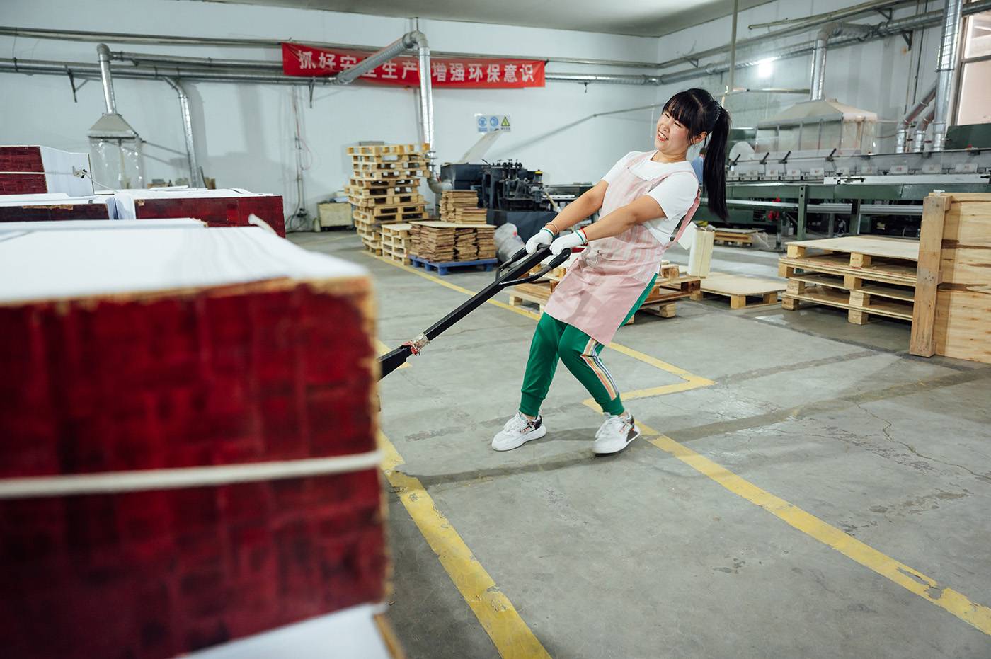 Woman In Printing Industry Portrait of Asian female factory worker working in the printing factory.