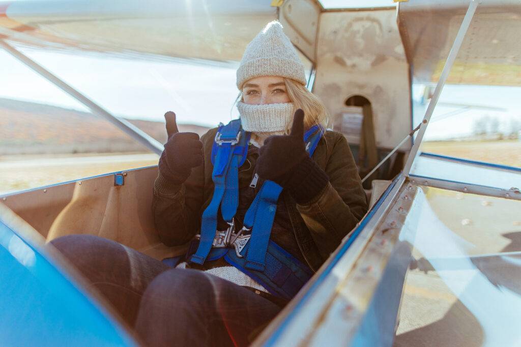 Woman Ready To Take Flight In A Glider Plane