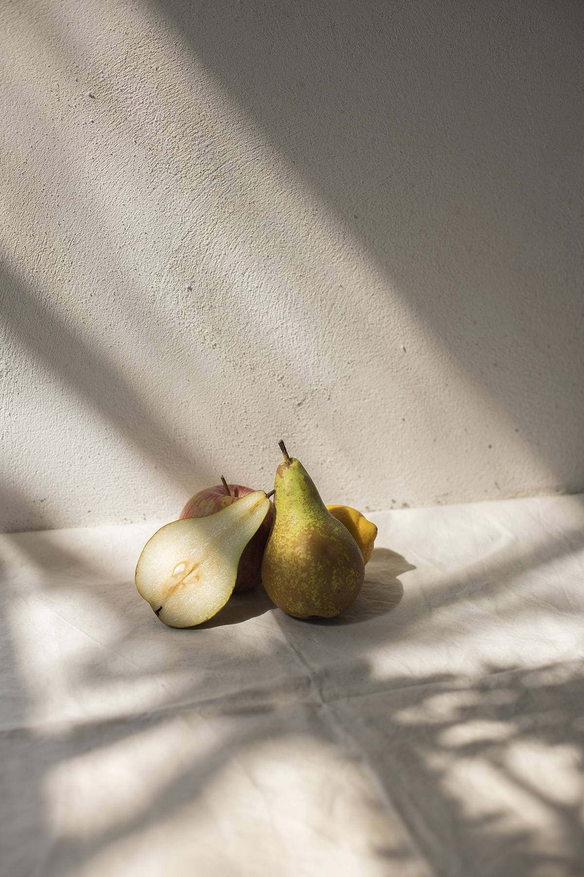Pear fruit still life with shadows and light