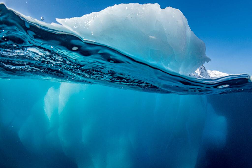 Iceberg emerging from the ocean in Antarctica