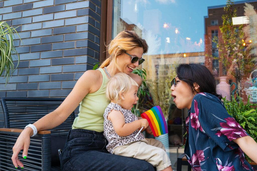 Happy LGBT Family With A Daughter