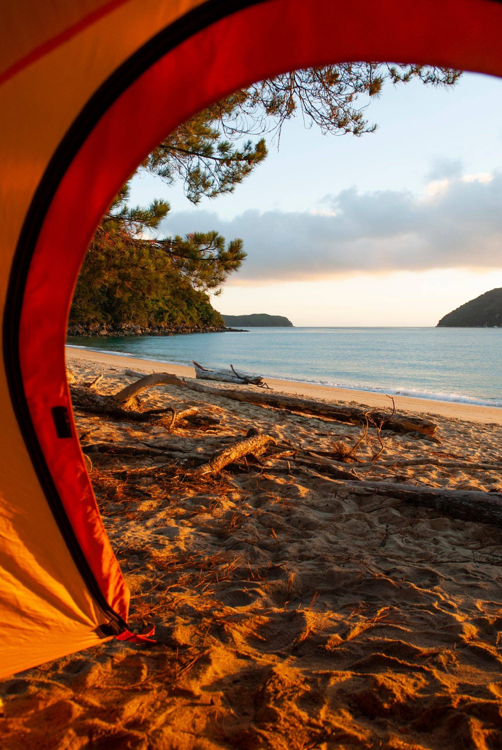 View out of a tent, while camping in Abel Tasman National Park, Tasman, New Zealand.