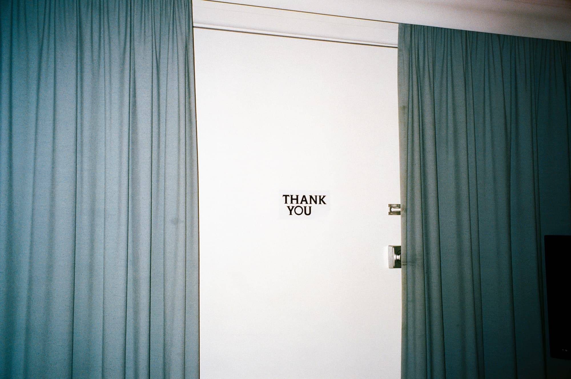 Thank You Sign On Interior Motel Door