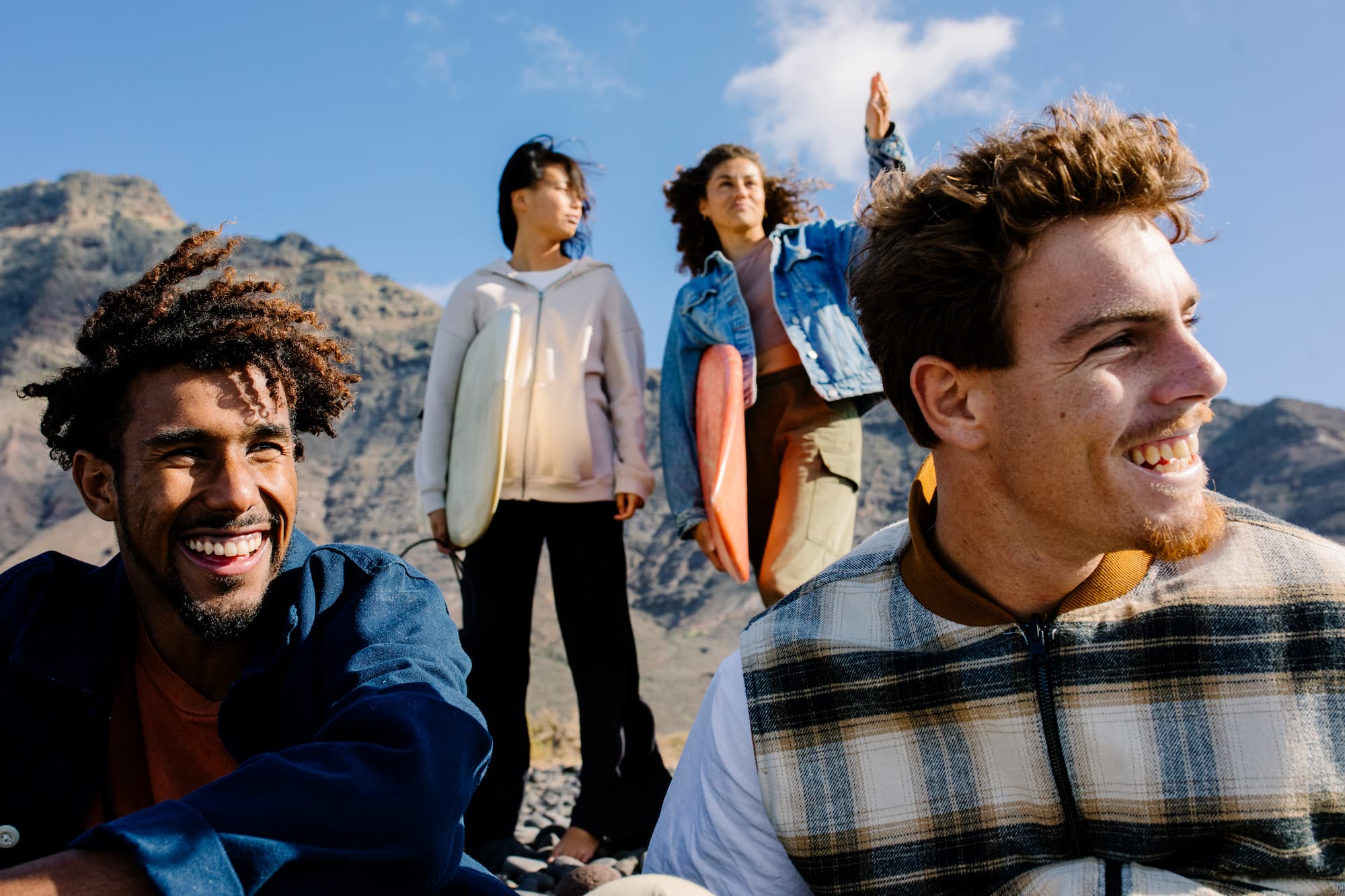 Friends from diverse backgrounds, enjoying a leisurely time outdoors