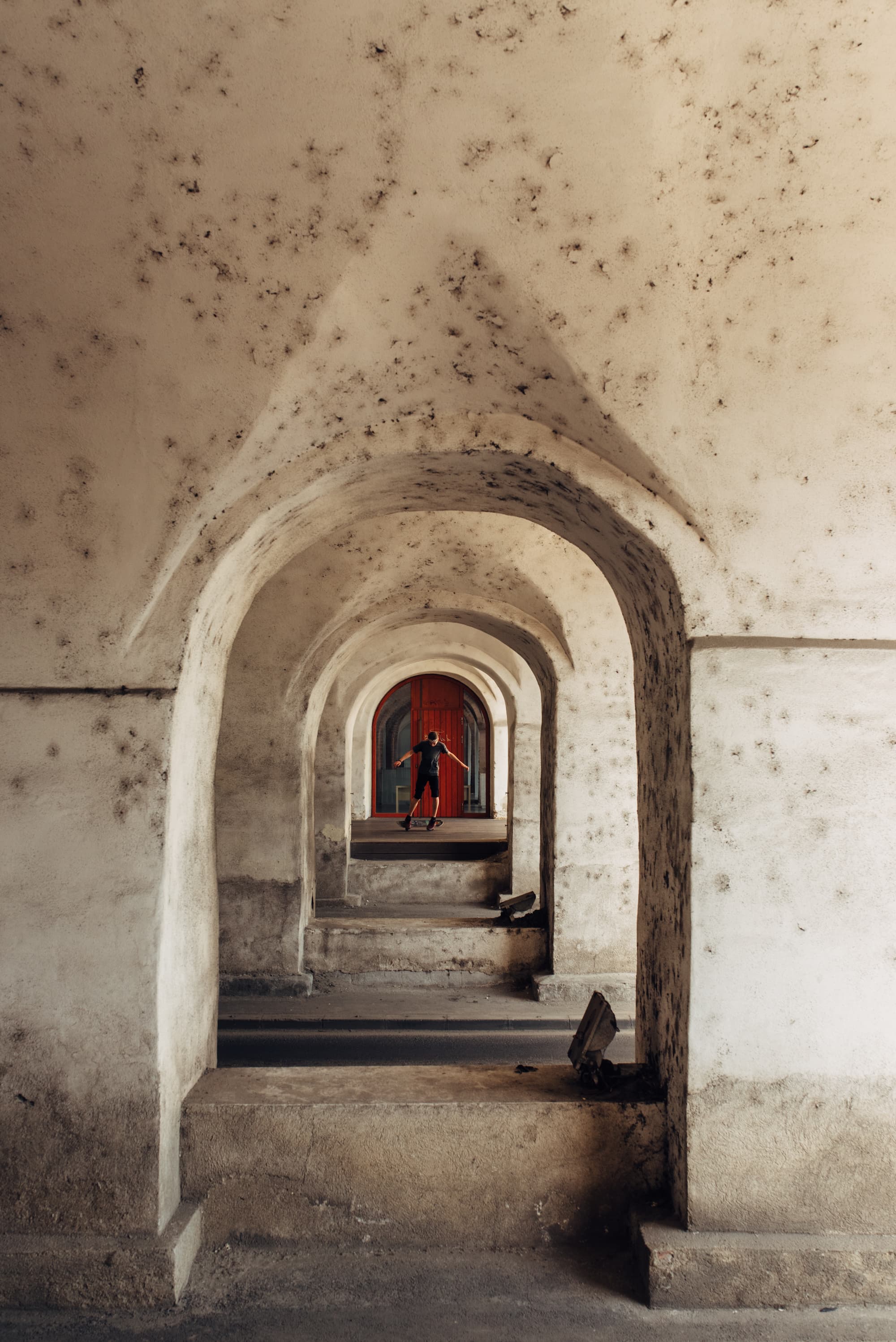 Old Archway Skater Skater by an archway in a fortress built in the early 1700 in Timisoara, Romania