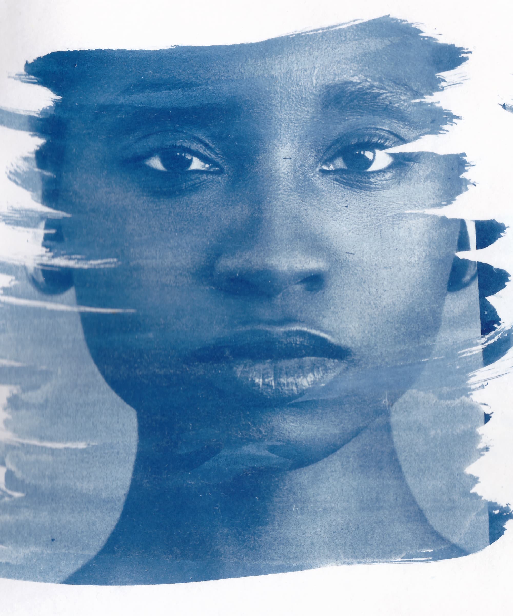 Cyanotype portrait of young black woman's face